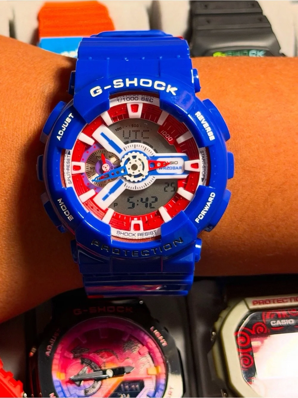 Casio G-Shock Blue Watch with Red and White Accents